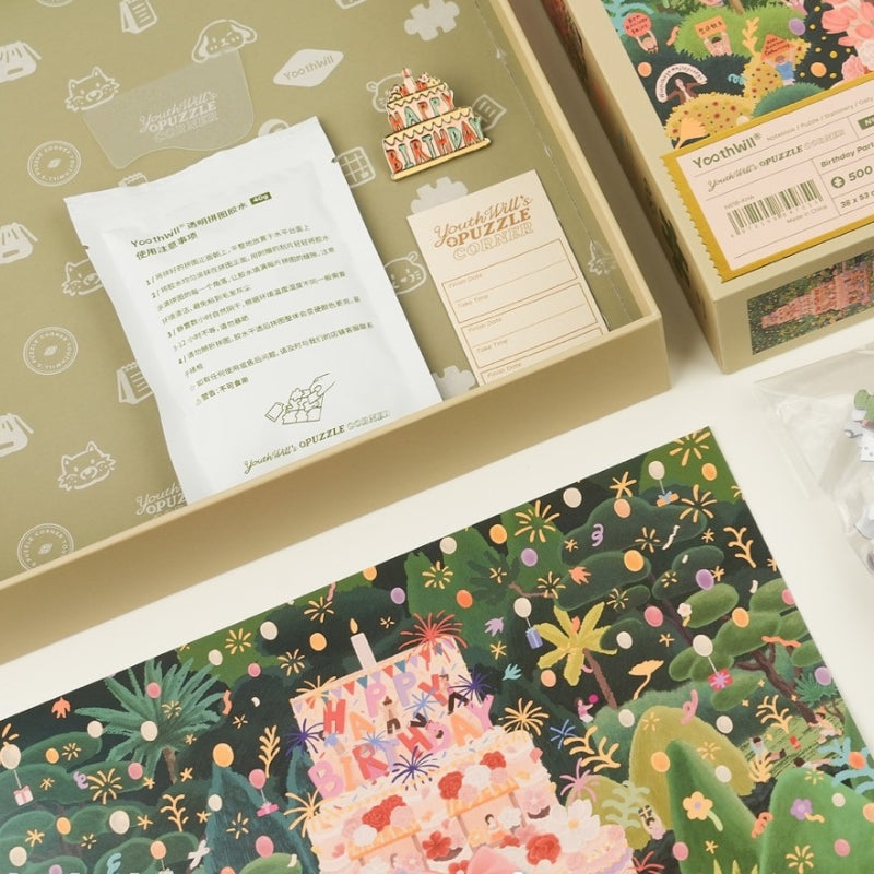 Open puzzle box showing puzzle glue, enamel pin, and puzzle record card.