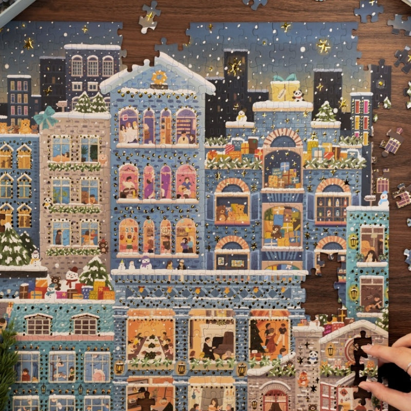 Jigsaw puzzle of a colorful cityscape with buildings and people on a wooden table.