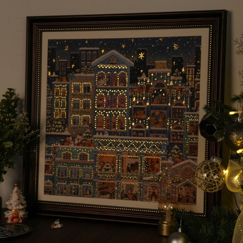 Completed Merry Snowy Night puzzle framed on a wall with Christmas decorations.