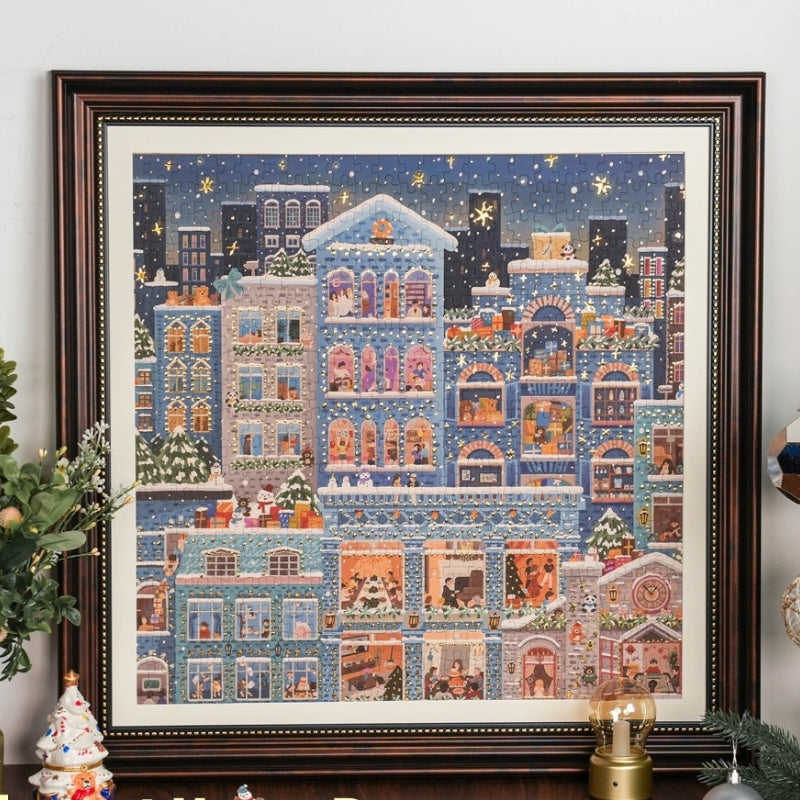 Framed Merry Snowy Night puzzle displayed against a white wall.