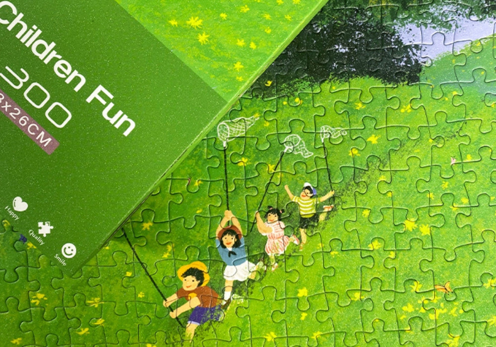 Assembled puzzle showing kids holding butterfly nets on a grassy hill with yellow flowers.