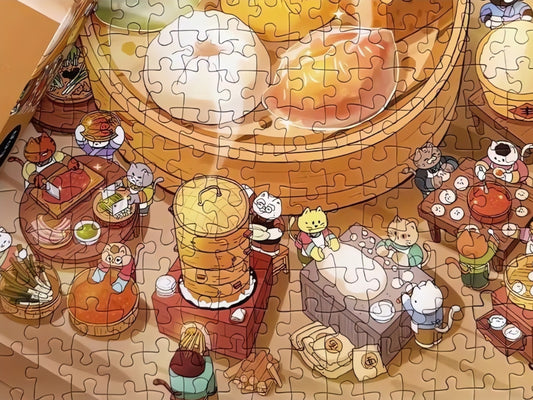 Close-up of completed Cat Restaurant puzzle with detailed food and cartoon cats at restaurant tables