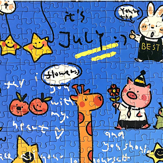 Detailed view of the completed Good Day puzzle showing a giraffe, pig, stars and July-themed cheerful design