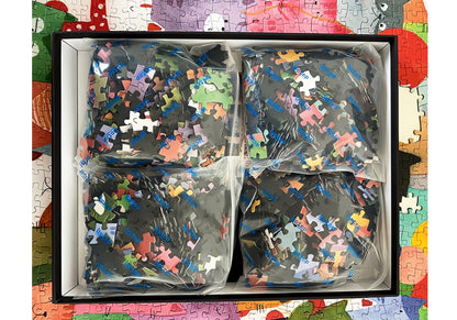 Botop Cats puzzle box opened showing sorted pieces in sealed bags