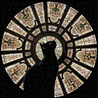 Finished round puzzle of a black cat sitting in front of a detailed stained glass dome