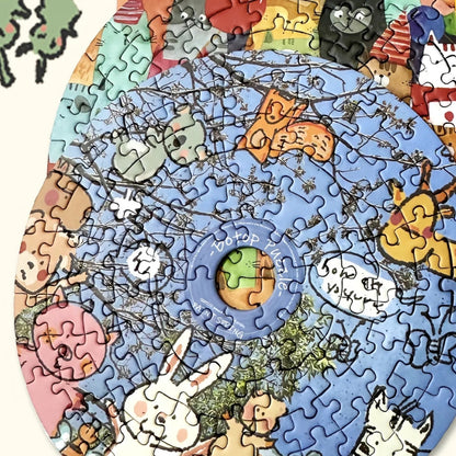 CD-shaped puzzle showing cute animals and spring trees – cute animal puzzle.