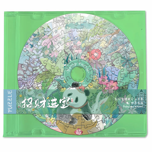 Botop CD-shaped mini puzzle showing a panda surrounded by flowers and greenery in a retro green CD case.