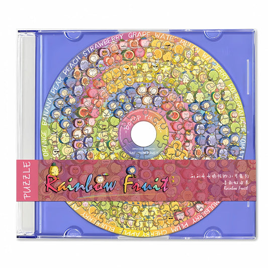 Botop CD-shaped mini puzzle featuring colourful rainbow fruit characters in concentric rings inside a blue retro CD case.