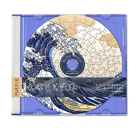 CD-shaped puzzle in case showing The Great Wave off Kanagawa – Japanese art puzzle.