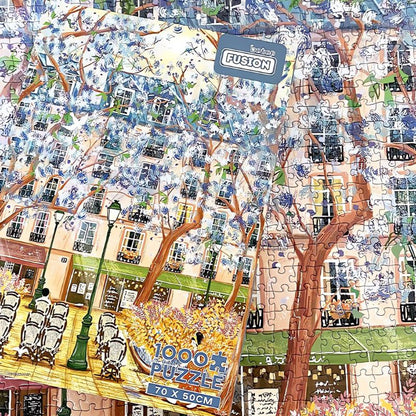 Jacaranda puzzle box resting over finished artwork of tree-lined café street