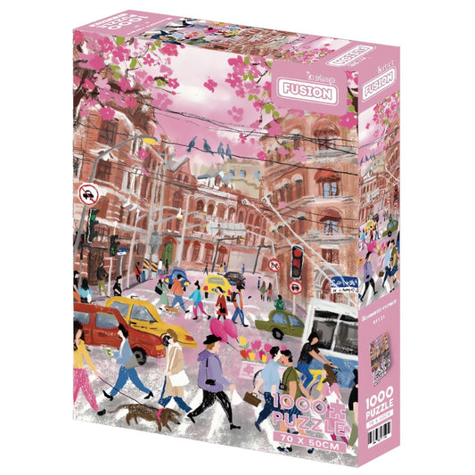 Box of Romantic Corner puzzle showing a busy crosswalk under pink blossoms and red brick buildings.
