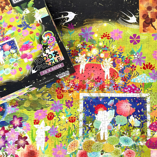 Finished puzzle with box, featuring bold flowers, framed figures, and bright colours.