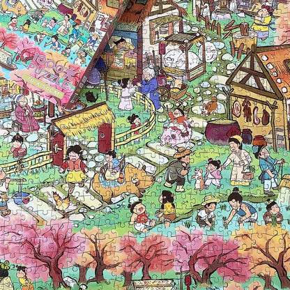 Unboxed Peach Blossom puzzle partially completed on table