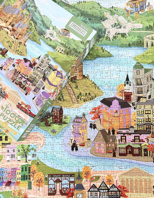 Assembled Wizarding World puzzle with box placed on top, showing fantasy town layout and magical river scene