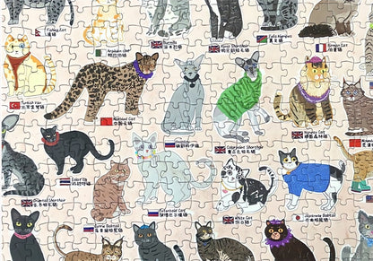 Section of 100 Cats puzzle displaying colourful cat breeds with country flags and breed names.