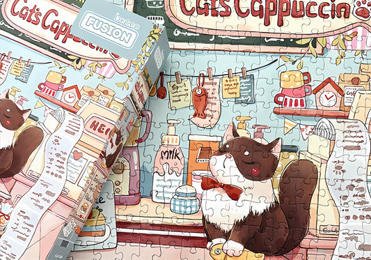 Close-up of the assembled Cat Cafe puzzle with the box placed on top.