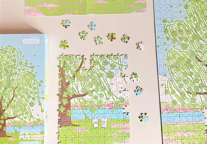 Lucky Tree puzzle in progress with box, guide sheet and scattered pieces