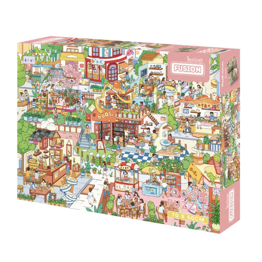 Small Streets 1000 piece puzzle box showing a lively town filled with bookstores, cafés, and local shops.