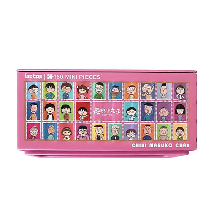 Botop mini puzzle in pink box featuring grid of Chibi Maruko-chan character faces.