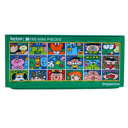 Mini puzzle tin showing a grid of colourful cartoon faces and fun messages