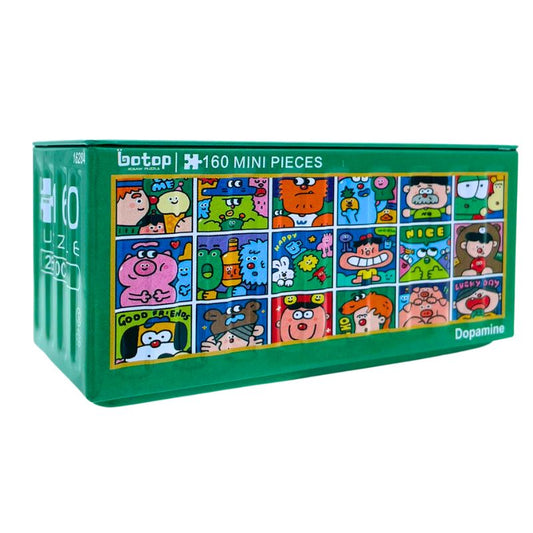 Mini puzzle tin showing a grid of colourful cartoon faces and fun messages