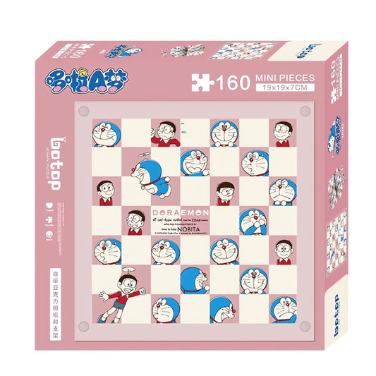 Doraemon checkerboard mini puzzle box featuring 160 pieces, showing a playful pink-and-white grid design with character faces