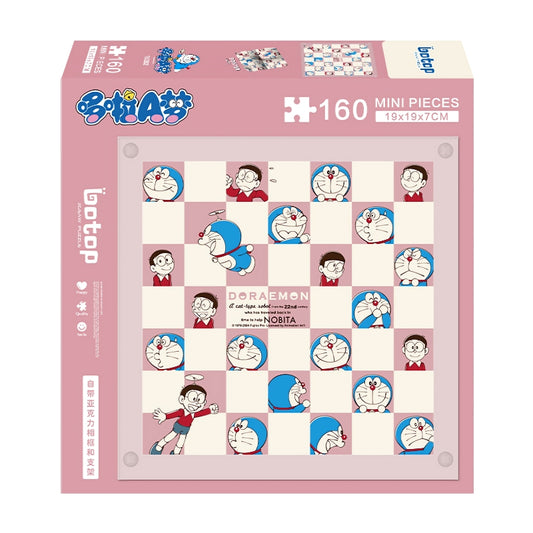 Doraemon checkerboard mini puzzle box featuring 160 pieces, showing a playful pink-and-white grid design with character faces
