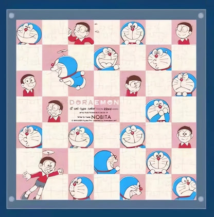 Flatlay image of the completed Doraemon checkerboard puzzle showing a symmetrical grid pattern with alternating Doraemon and