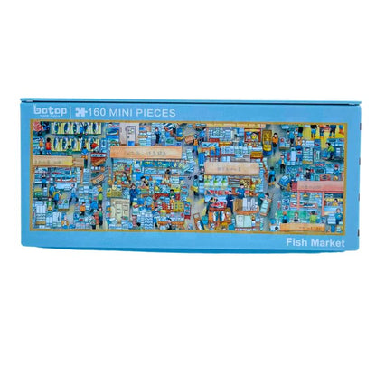 Botop 160 mini piece puzzle in a blue metal container featuring a colourful fish market scene.