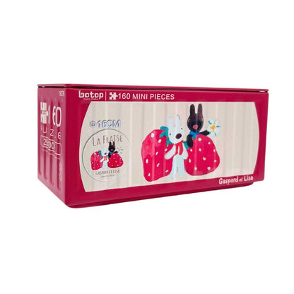Red Botop puzzle tin featuring Gaspard and Lisa holding giant strawberries with “La Fraise” theme.