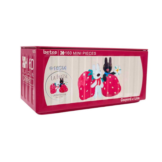 Red Botop puzzle tin featuring Gaspard and Lisa holding giant strawberries with “La Fraise” theme.