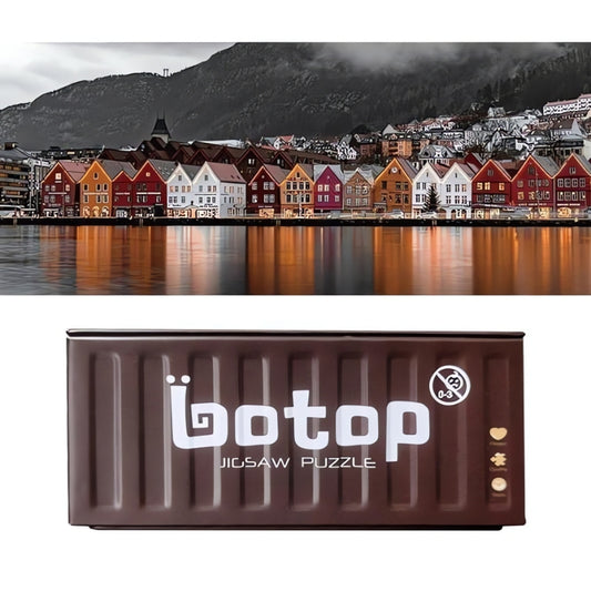 Botop mini puzzle stored in a brown metal box with white logo.