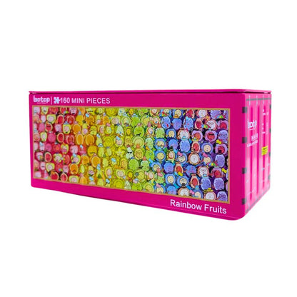 Botop mini puzzle in pink metal box with rainbow fruit characters on label.