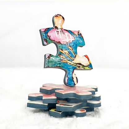 Close-up of a thick puzzle piece from Journey in the Sky with a textured surface.