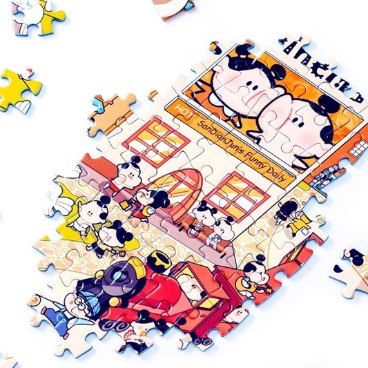 Close-up of assembled Keytime Garden Party puzzle showing cartoon cinema scene with bright colours and embossed texture.
