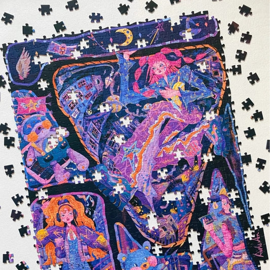 A vibrant, partially assembled 1000-piece jigsaw puzzle featuring a whimsical, cosmic-themed illustration in rich purples, blues, and pinks, with scattered puzzle pieces around the edges.
