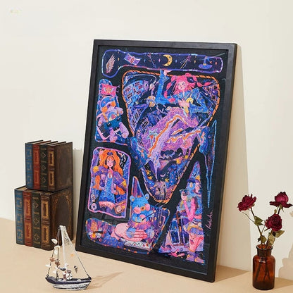 The completed puzzle art displayed in a sleek black frame, leaning against a wall beside vintage books and a small ship ornament.