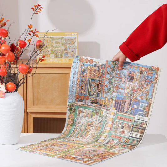 Close-up of Happiness Hut Keytime 1000-piece puzzle being held, showing detailed shop and home scenes.