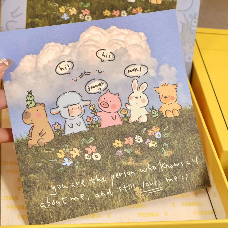 Matching art card of the animal friends under the fluffy cloud inside the puzzle box.
