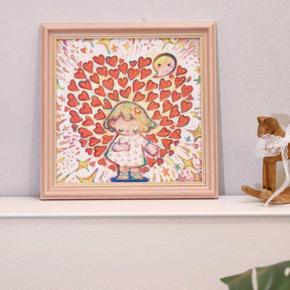 Framed completed “Love Out Loud” jigsaw puzzle on a shelf with radiant red hearts and cheerful character.