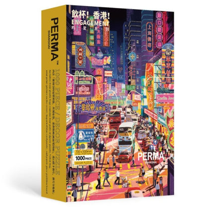Front-angled view of the “Salute Hong Kong” PERMA puzzle packaging box with the neon cityscape illustration.