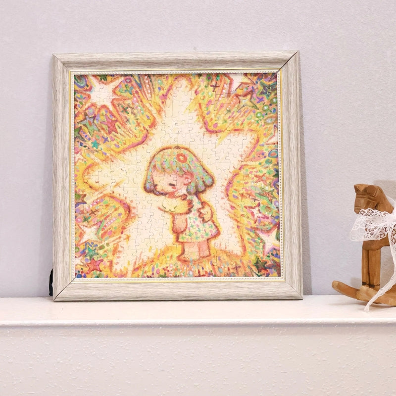 Framed completed The Hugging Star puzzle displayed on a white shelf beside a wooden rocking horse.