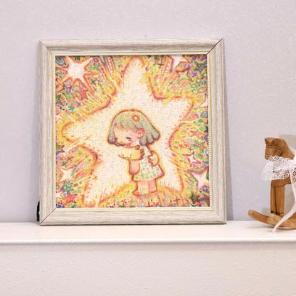 Framed completed The Hugging Star puzzle displayed on a white shelf beside a wooden rocking horse.