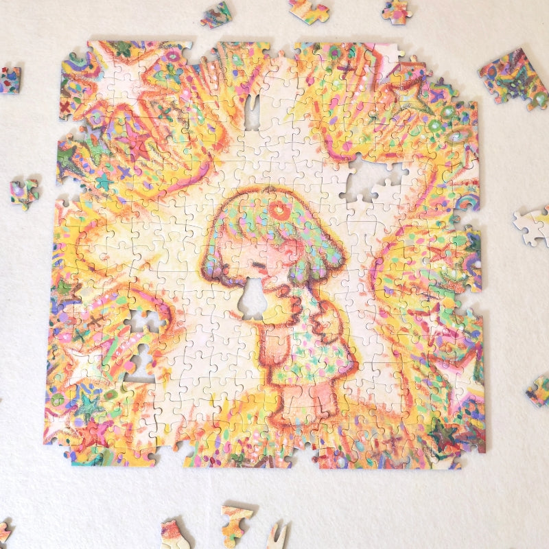 Partially assembled The Hugging Star puzzle on a cream background, showing the central hugging figure and star outline.