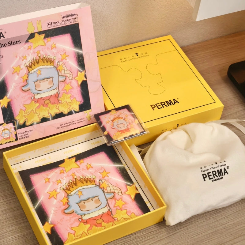 Open PERMA King of Stars puzzle box showing the 321-piece set, magnet, and yellow storage box.