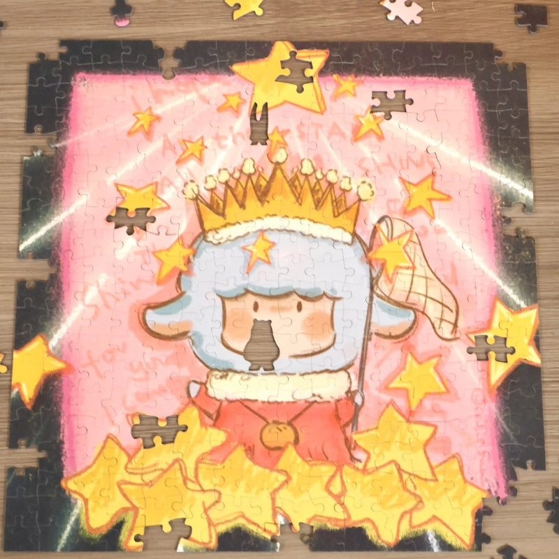Partially assembled King of Stars jigsaw showing the crowned lamb surrounded by golden stars.