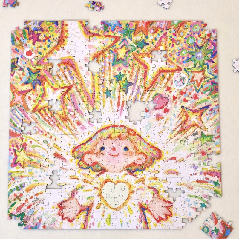 Partially assembled “Tiny Me, Mighty Power” puzzle on a tabletop showing unfinished sections.