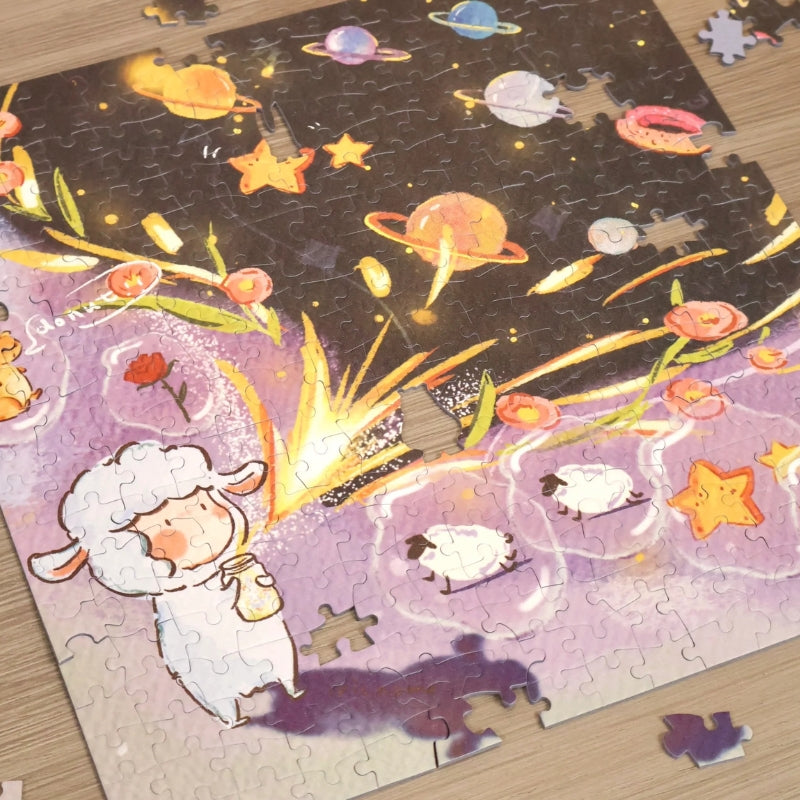 Partially assembled ‘Unlock the Universe’ jigsaw puzzle laid out on a tabletop, showing scattered pieces with the galaxy design.