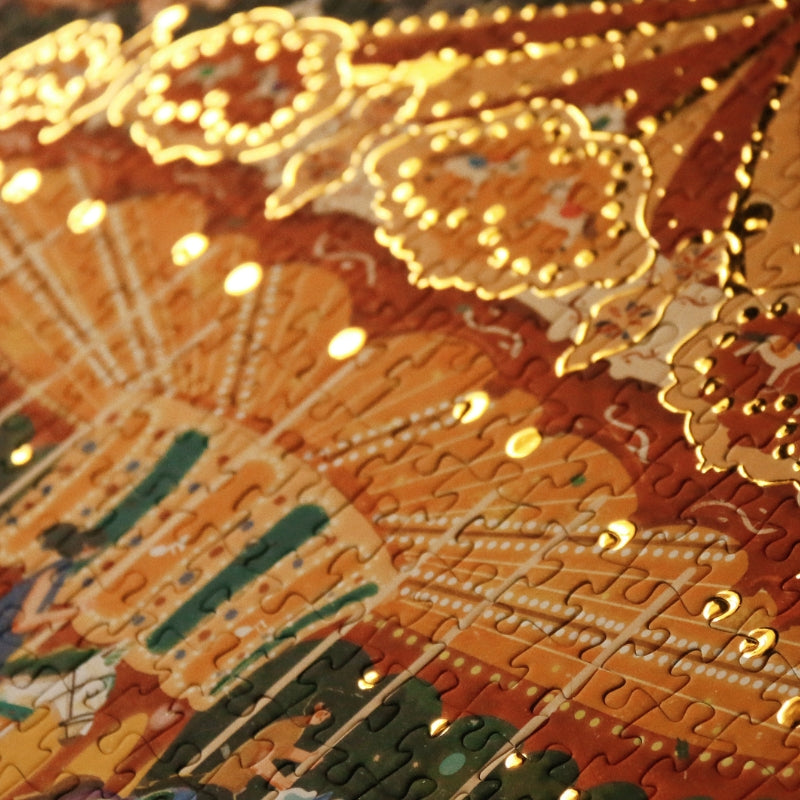 Puzzle close-up showing golden lights and fine details of the carousel.