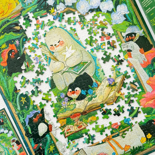 Bedtime Story jigsaw puzzle partially completed showing bear holding a feather pen and penguins among open books.